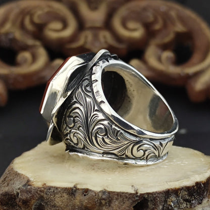 The ring worn by Osman in the TV series Establishment Osman, Double-headed eagle carving with the Seljuk coat of arms on agate stone.